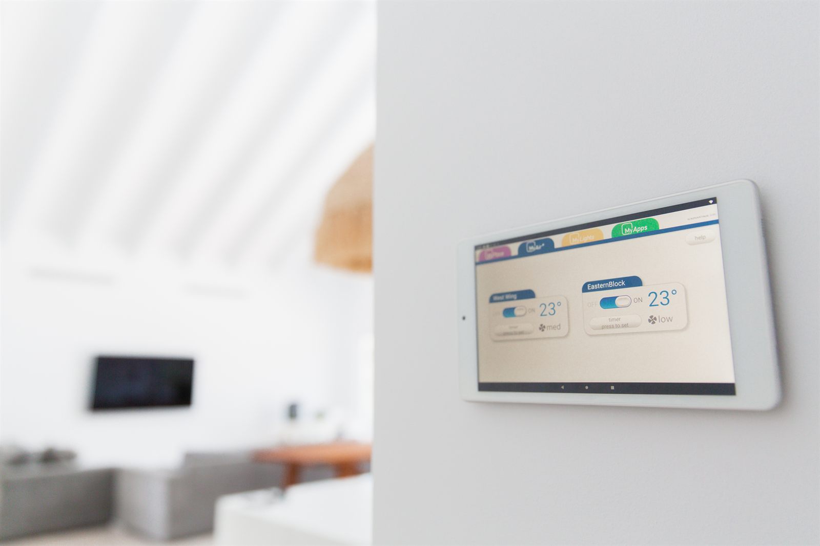 Wall-mounted MyAir colour touchscreen in a modern Gold Coast home
