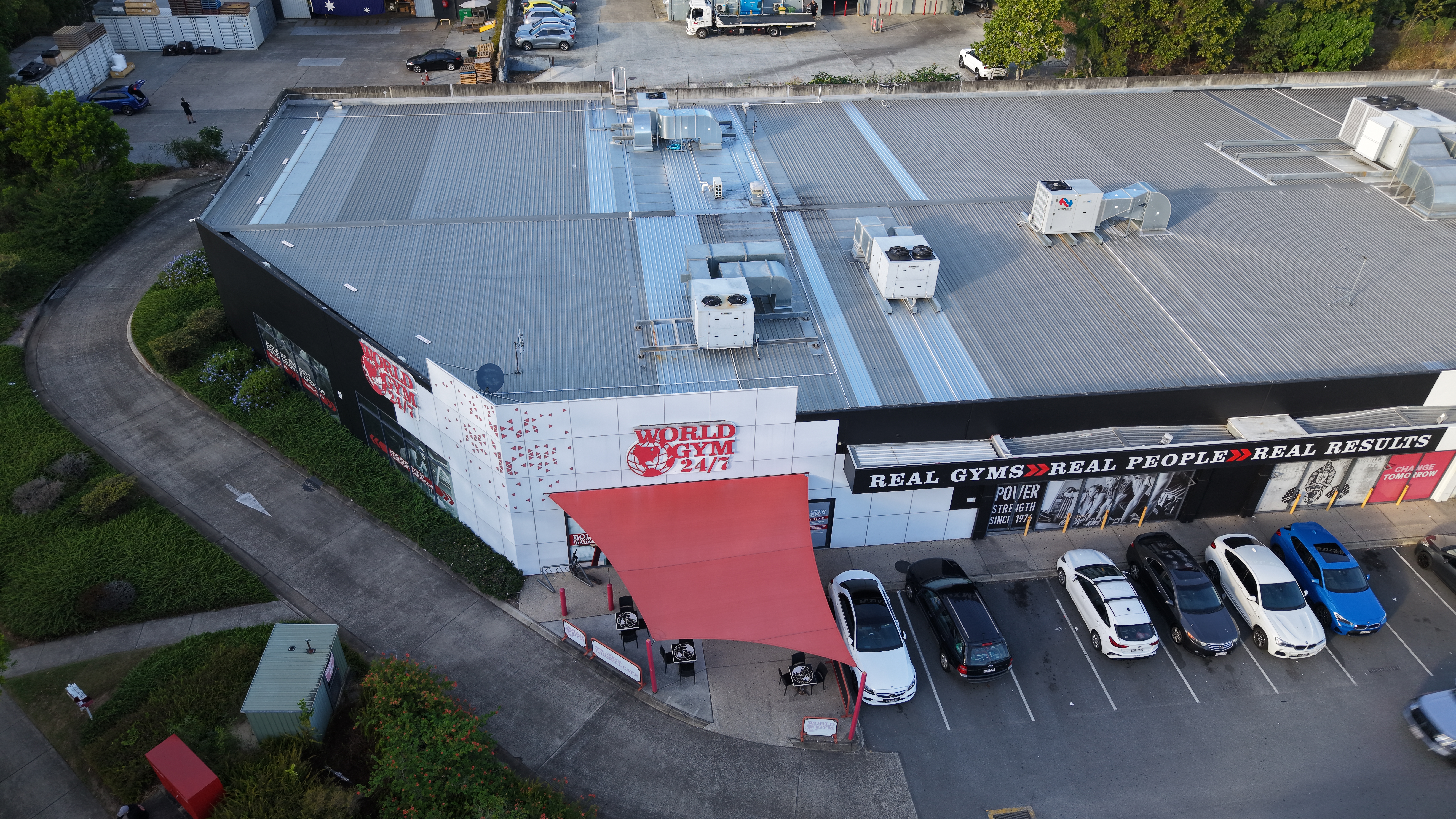 Rooftop air conditioning units on a commercial building maintained by COLDCOAST